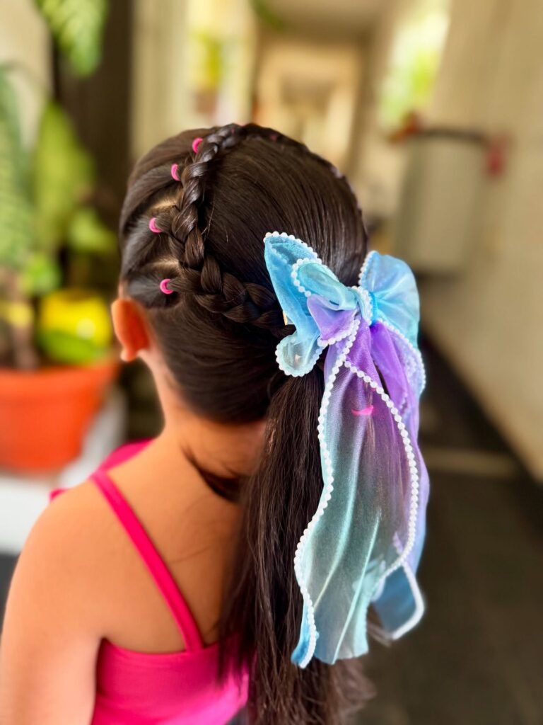 Braided Ponytail With Blue Butterfly Bow