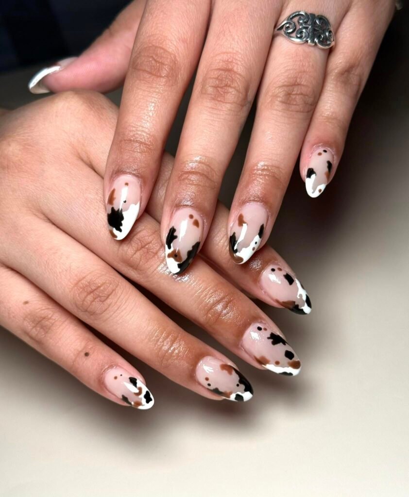 Nude Almond Cow Print Nails with Brown and Black Spots