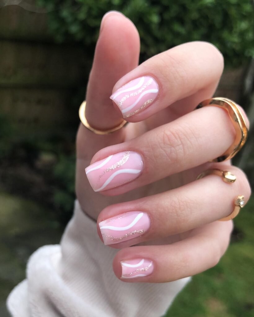  Pink Swirl Nails with White and Gold Lines