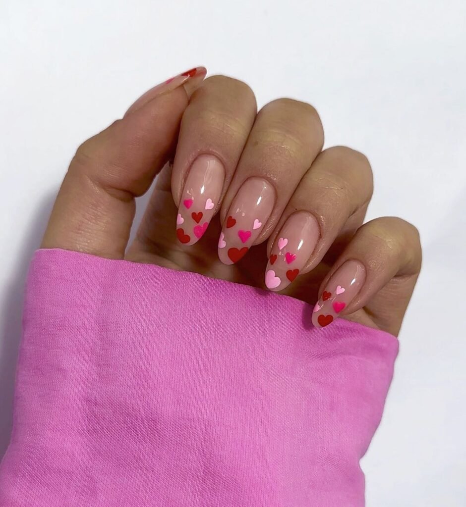 Scattered Pink and Red Heart Almond Nails