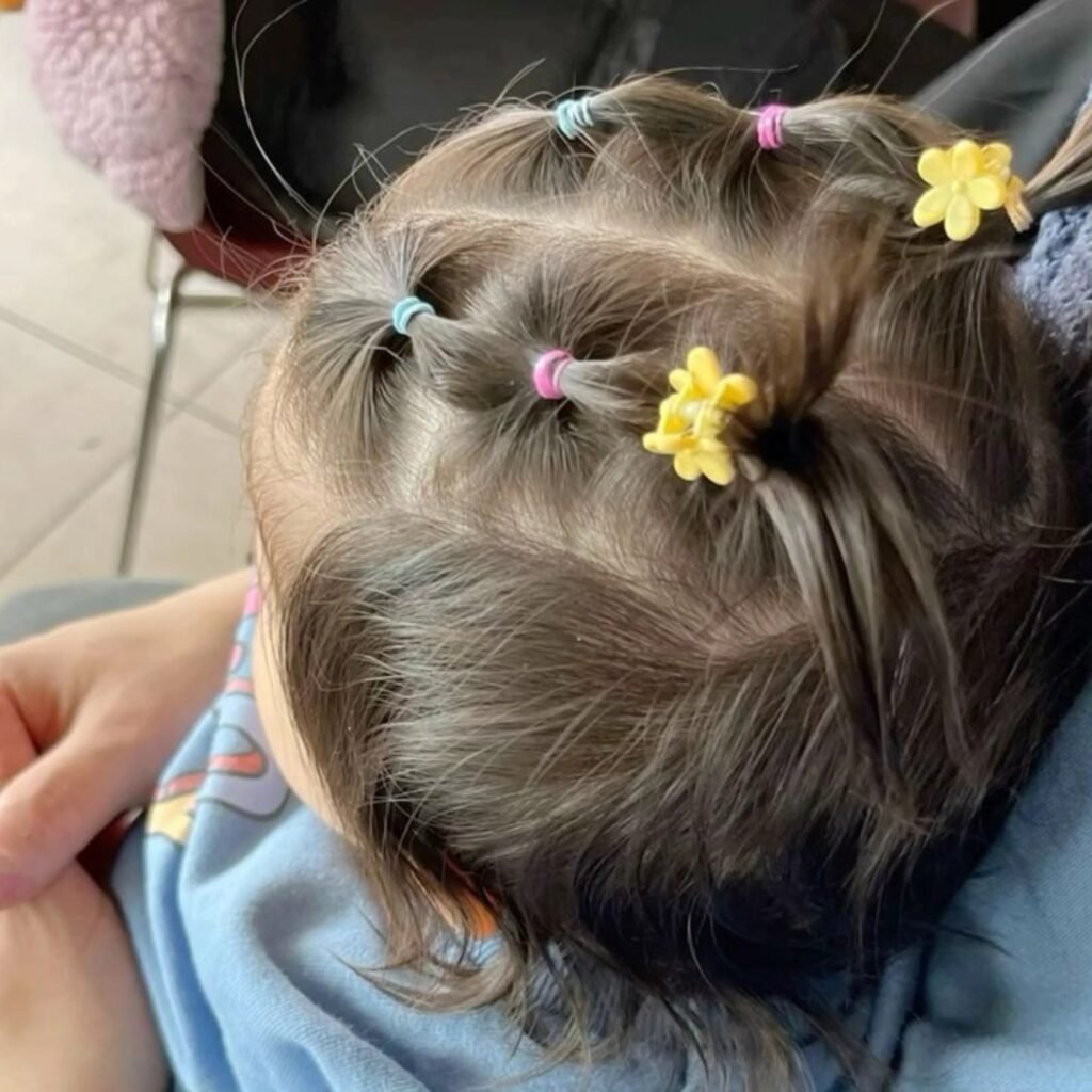 Tiny Ponytail Sections With Flower Clips